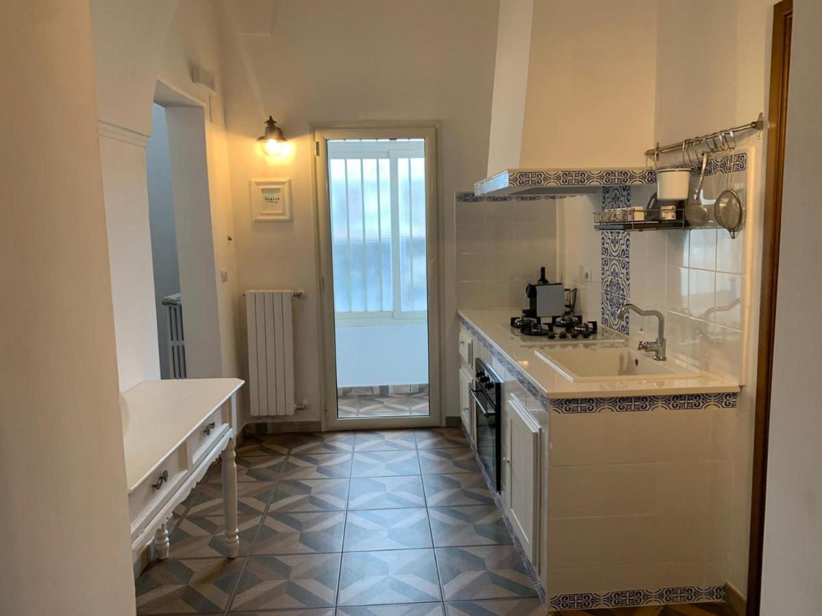 Palazzo Primitivo Casa Vacanze Appartamento มันดูเรีย ภายนอก รูปภาพ
