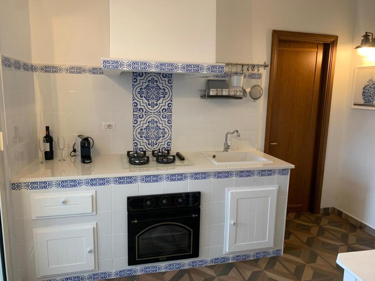 Palazzo Primitivo Casa Vacanze Appartamento มันดูเรีย ภายนอก รูปภาพ